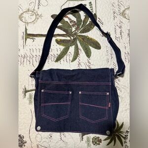 ROXY messenger bag. Nearly new blue jean pink stitching.